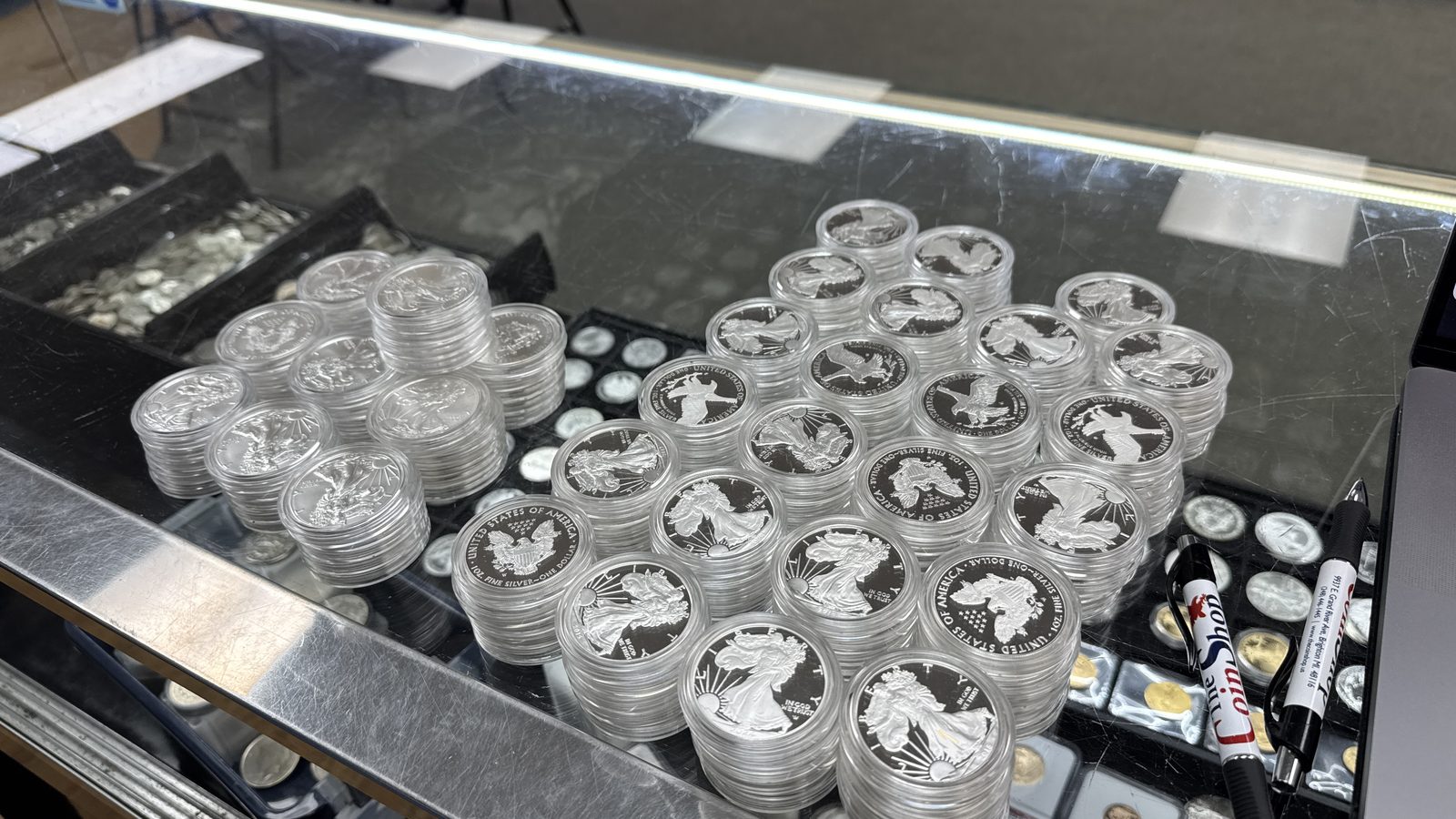 American Silver Eagles in capsules at The Coin Shop counter